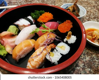 Closeup Sushi In The Black Japanese Lacquer Tray.