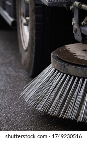 Close-up sweeper machine cleaning. Concept clean streets from debris. Selective focus.