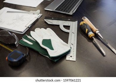 Close-up Of Table With Document Laptop And Work Tools Preparing For Manual Work