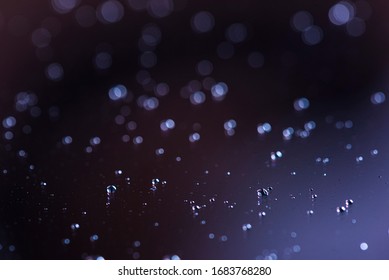 Closeup Of A Tablet Screen With Droplets On Its Surface After Sneezing In The Age Of Coronavirus