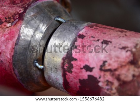 Closeup tack weld connection between pipe reduce. Fit-up pipeline before welding by Tungsten Inert Gas Welding process (TIG). 