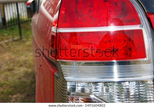 Close-up taillight\
of a brake light in a\
car.
