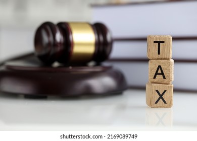 Close-up Of Tax Word Collected Of Wooden Blocks Letters, Tax-filling. Government, State Taxes, Calculation Individual Income, Violation Of Tax Laws And Wealth Tax Return Concept