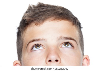 Closeup Of Teenager Boy Looking Up, Isolated On White