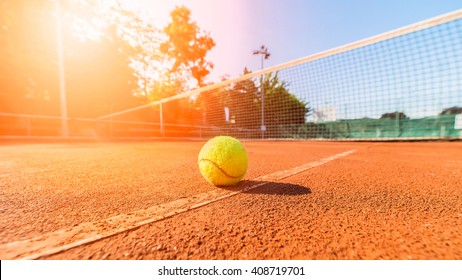 close-up tennis ball and net on court - Shutterstock ID 408719701