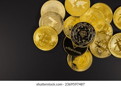 Close-up of Tether coin on top of various cryptocurrencies - Shutterstock ID 2369597487