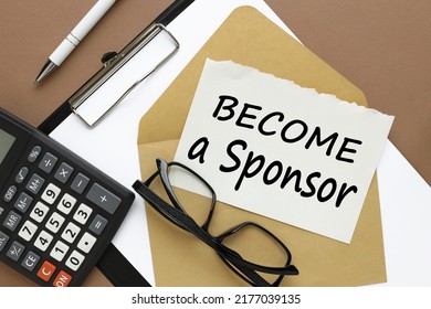 Close-up Of Text BECOME A SPONSOR, Business Concept Image With Brown Background