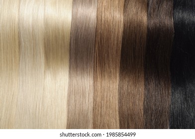 Closeup Texture of A Collection of Different Colors of Pre Bonded Straight Stick Nail Tip (U tip fusion) Human Hair Extensions
