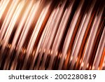 Closeup texture copper cable rolled coil up on industry factory.