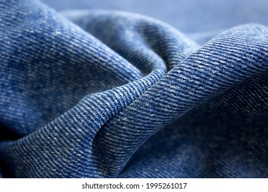 Close-up texture of denim color fabric or cloth in denim color. Fabric texture of denim background - Powered by Shutterstock