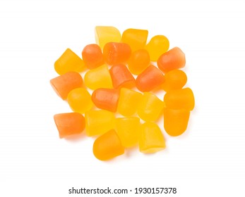 Close-up Texture Of Orange And Yellow Multivitamin Gummies. Healthy Lifestyle Concept.