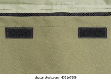 Close-up texture of soldier vest and Velcro of behind bag