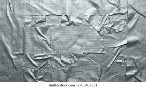 Close-up textured surface of overlapping silver duct tape strips creating a rugged, industrial background
