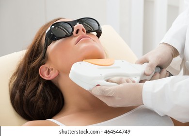 Close-up Of A Therapist Giving Laser Epilation Treatment On Women's Neck - Shutterstock ID 464544749