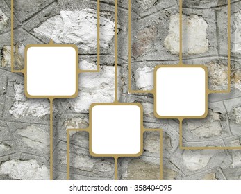 Close-up of three connected brown square frames on stone wall background