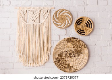 Closeup of three decorative straw plates - Shutterstock ID 2371920377