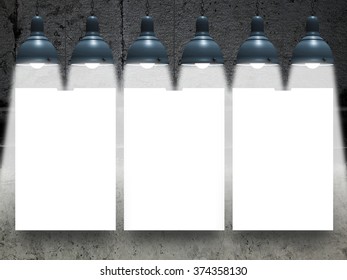Close-up of three hanged paper frames with lamps on old weathered wall background