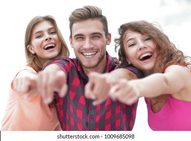 Closeup Of Three Happy Young People Showing Hands Forward