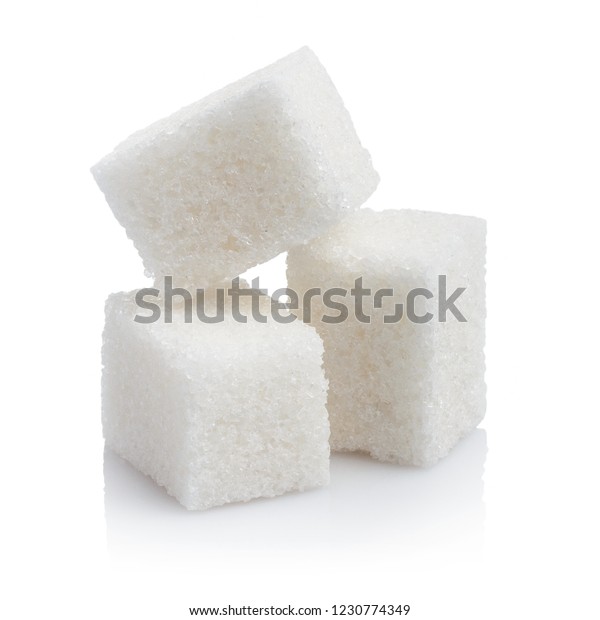 Close-up of three white sugar cubes, isolated\
on white background