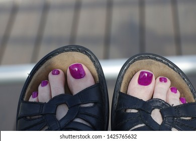 Closeup of a toes of a woman in sandles
