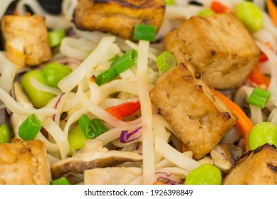 A Close-up Of Tofu And Edamame Noodles