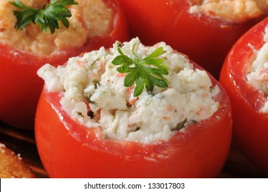 Closeup of a tomato stuffed with crab spinach dip