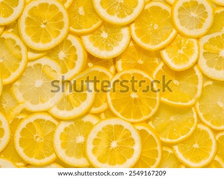 Close-up Top down full frame Flat Lay photograph of Fresh Citrus Lemon Slices