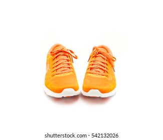 bright orange running shoes