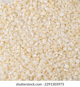 Closeup, top view of dried white corn or canjica. Food backdrop. - Shutterstock ID 2291303973