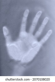 Closeup Top View Of Palm Hand Imprint Seen Through Transparent Tracing Paper Texture