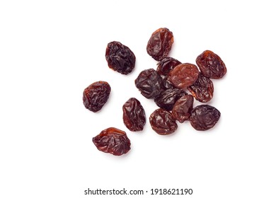 Close-up top view of Raisins isolated on white background.