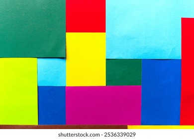 Close-up top view of rectangle shaped and square shaped blank colorful paper sheets. Photo taken October 27th, 2024, Zurich, Switzerland.