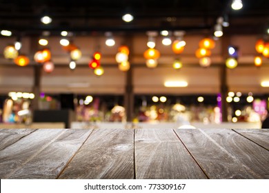 closeup top wood table with Blur Background, for your photo montage or product display, Space for placing items on the table.