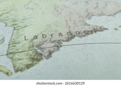 A close-up of a topographic map showcasing Labrador, the eastern part of Newfoundland and Labrador in Canada Features include mountains, hills, valleys, lowlands, coastline, rivers, streams, labels,