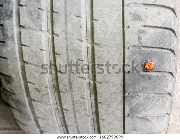 closeup of a Torn tire\
at tire warehouse 