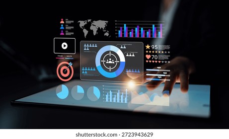 A close-up of a touchscreen device displaying various digital analytics charts and graphics, illustrating modern business analysis and data visualization techniques. Gantry