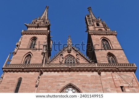Closeup of towers of beautiful red sandstone church of Basel Minster Switzerland 