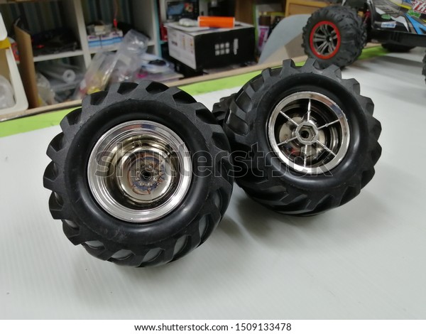 Close-up Toy remote  car\
wheel.
