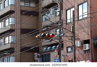 Close-up of the traffic light in Kyoto, Japan with streetscape. Transportation signal.  - Powered by Shutterstock