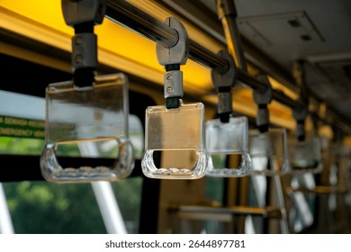 Close-up to Train handle in selected focus by public transportation that isolated from background
