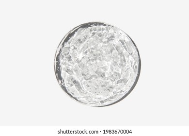 Close-up transparent cosmetic gel in glass isolated on white background. Make-up and cosmetics texture background, skincare product.  - Shutterstock ID 1983670004
