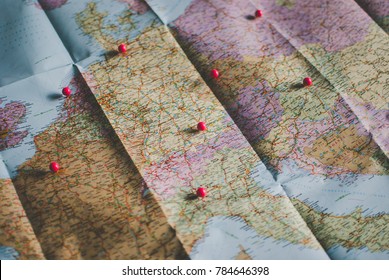 Closeup Of A Traveler's Road Map In Vintage Retro Colors. Countries And Cities Of Western Europe On The Map.