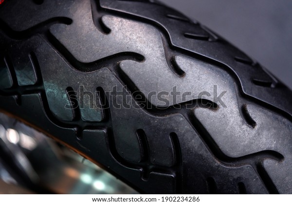Close-up of a
tread pattern on a motorbike
wheel