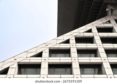 A close-up of the triangular art building