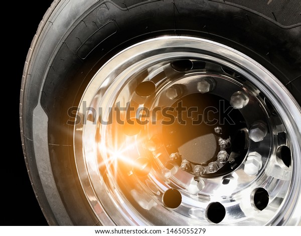 closeup truck wheel and
a new truck tire