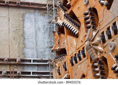 Close-up of tunnel boring machine cutter head constructing metro