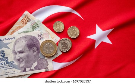 Close-up of Turkish Lira on Turkish Flag. Turkey's donation campaign. We are enough for us my turkey Turkish: Hashtag bizbizeyeteriz Turkiyem. - Shutterstock ID 1697028337