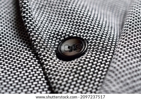 Closeup of Tweed Jacket Button