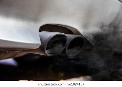 Close-up Of Two Exhaust Pipe On The Car