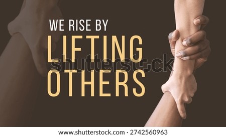 Close-up of two hands supporting each other with inspirational quote 'We rise by lifting others' in a minimalist setting with warm tones.